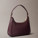 Mala de ombro com monograma em relevo