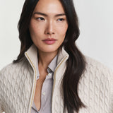 Casaco de malha entrançada com fecho de correr