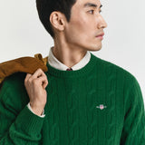 Camisola de malha entrançada de lã com decote redondo